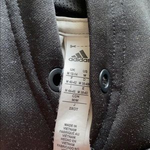 Size medium woman’s adidas pull over